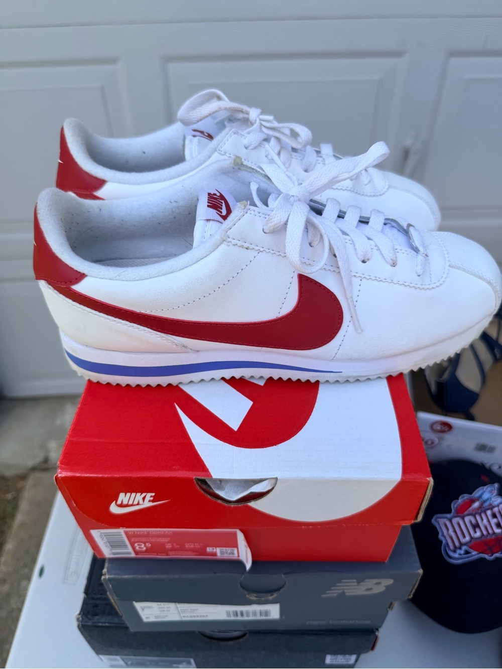 Nike Women’s Cortez Sneakers in White and Red